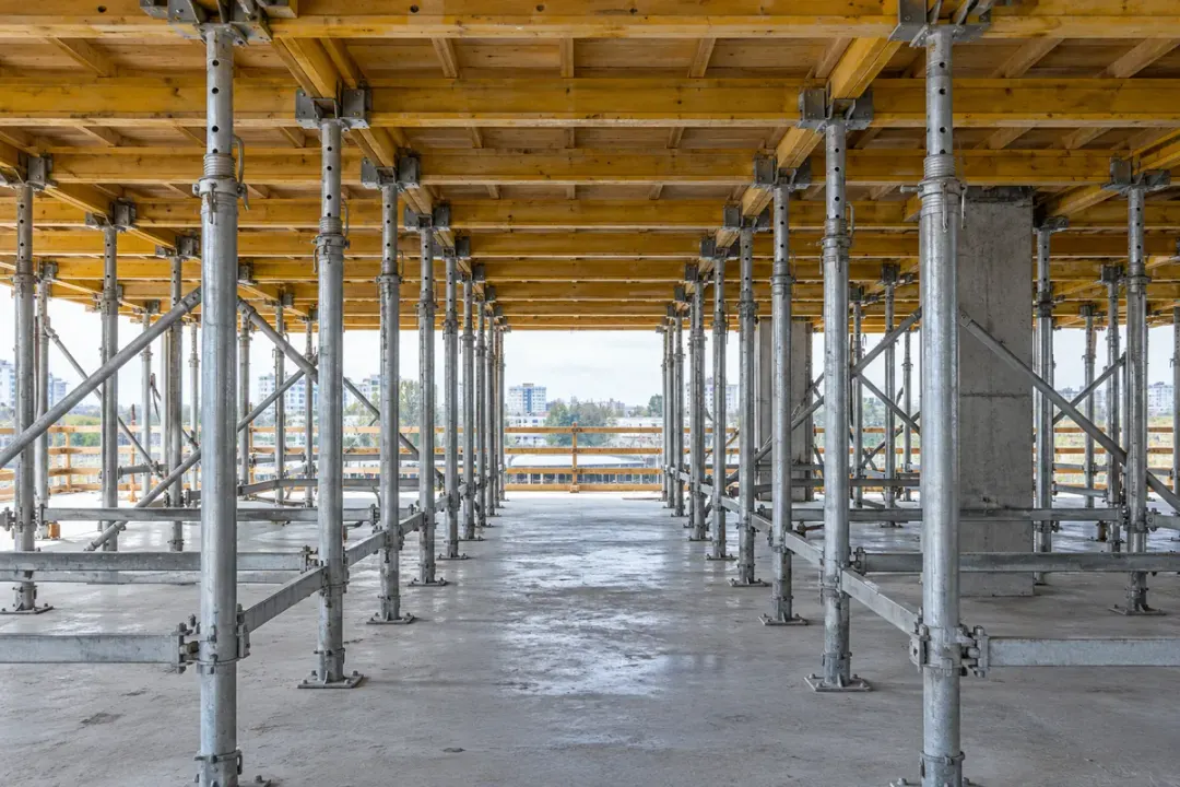 Formwork support frame with uprights, bracing and top supports.