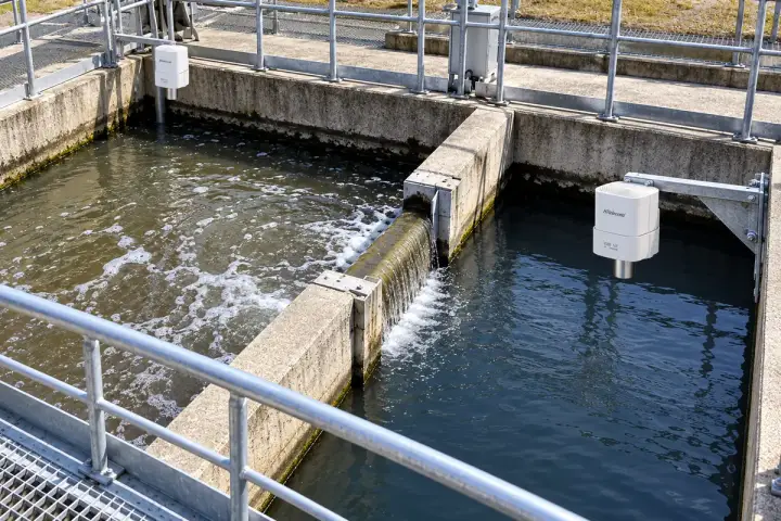 Concept installation of two Hitelecom radar sensors above separate upstream and downstream wastewater surfaces.