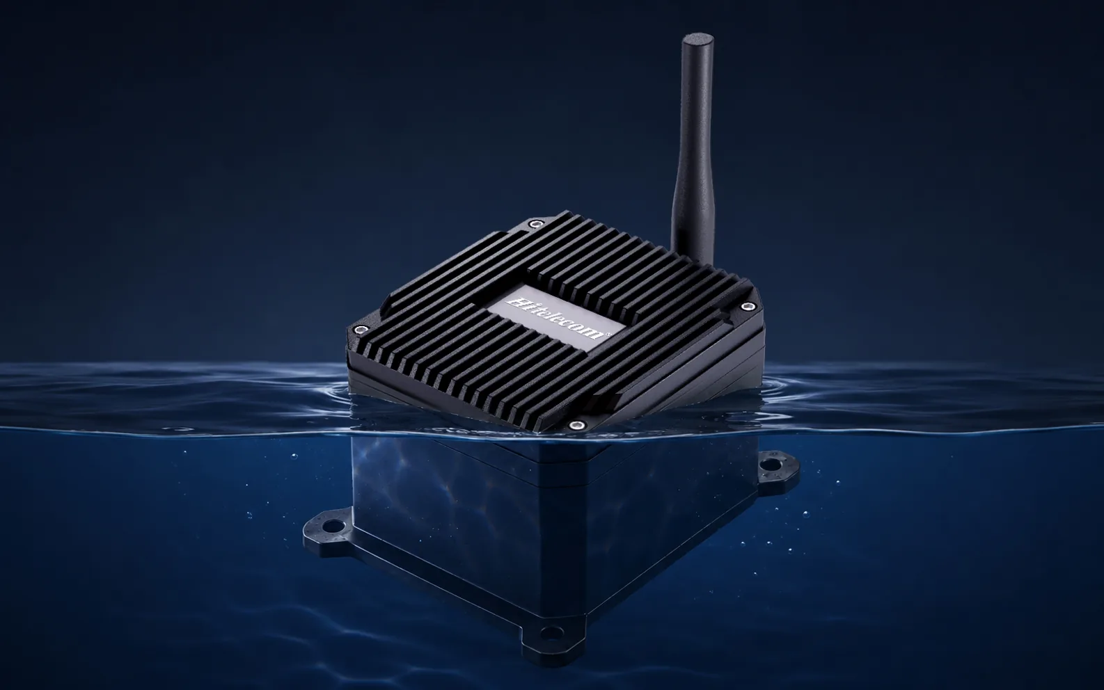 Hitelecom industrial IoT enclosure half-submerged in a controlled water-protection test